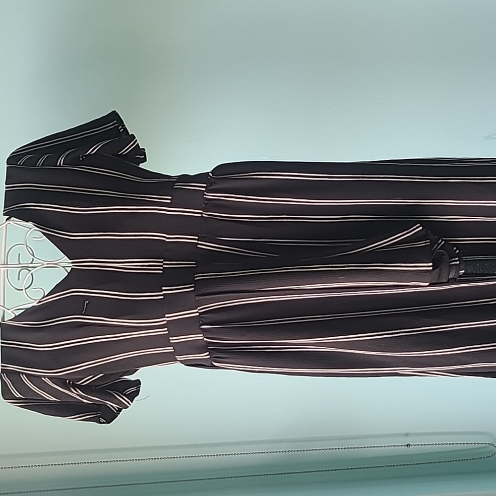 Jumper shorts, looks like dress in back